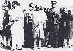 Subhas Chandra Bose in uniform as the GOC of Bengal Volunteers, with Congress president Motilal Nehru taking the salute